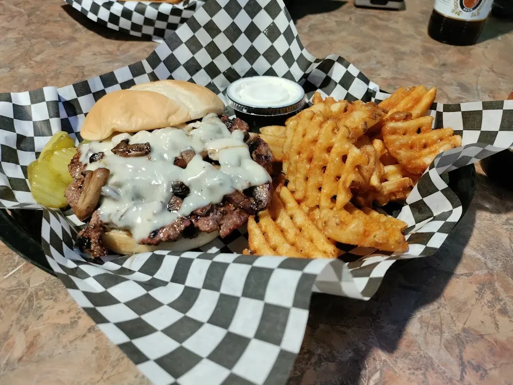 Mushroom and Swiss Burger with Waffle Fries